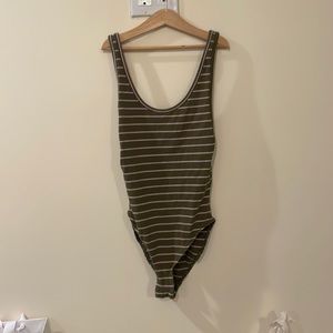 Out from under. Medium. Green and pink.